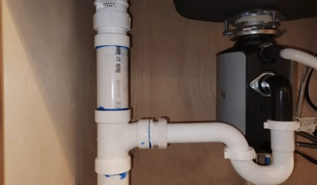 garbage disposal and sink venting system