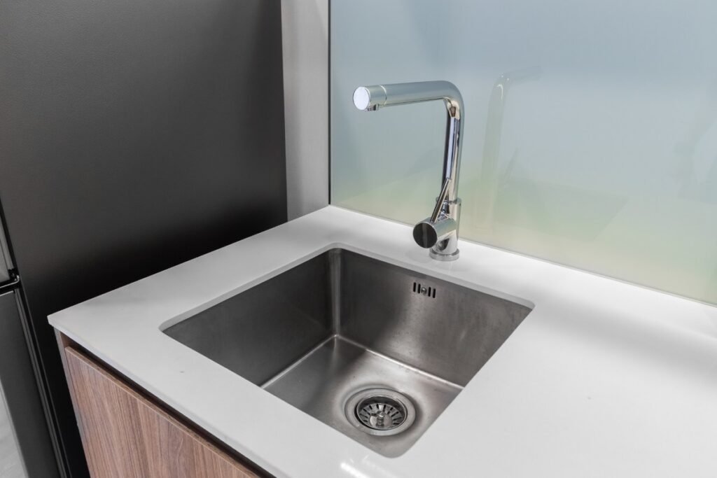 Dry and polish the kitchen sink