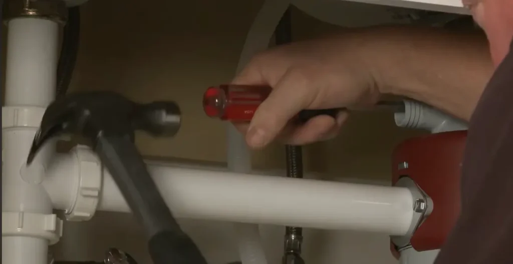 unplug-knockout-disposal-plug-with-screw-driiver-and-hammer