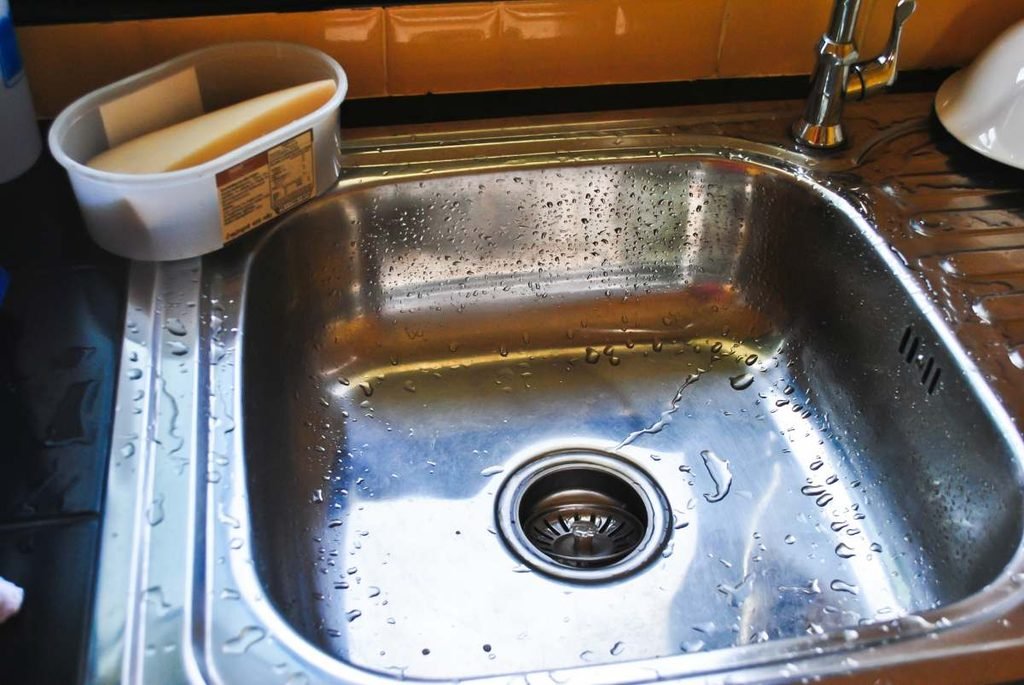 Clear and Rinse the Sink